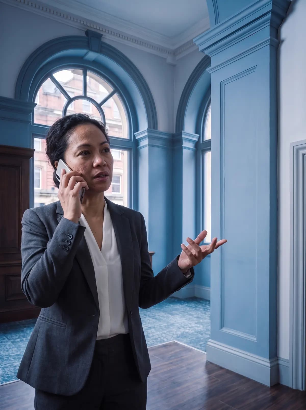 Client on the phone in an entrance hall