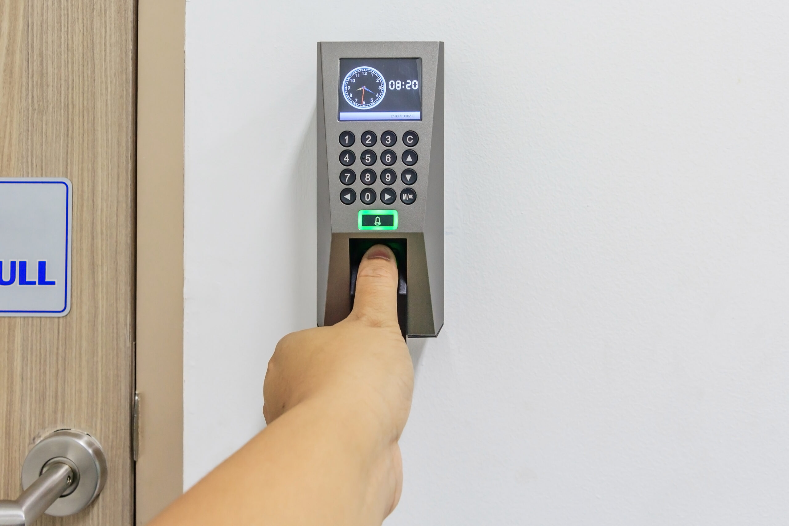 an employee time tracking system integrated with the business' access control system