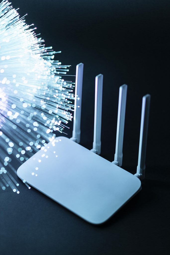 Wi fi router with blue optical fiber min 683x1024